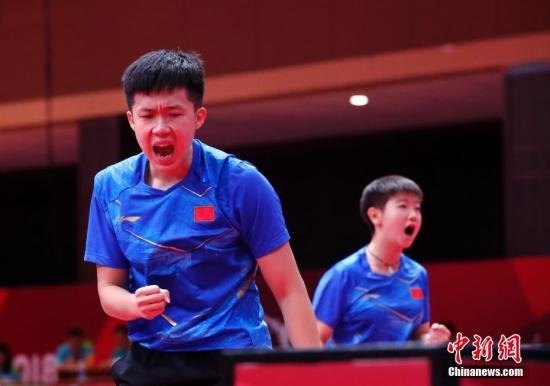 資料圖：雅加達(dá)亞運(yùn)會(huì)，王楚欽/孫穎莎奪得混雙冠軍。 <a target='_blank' href='/'>中新社</a>記者 劉關(guān)關(guān) 攝