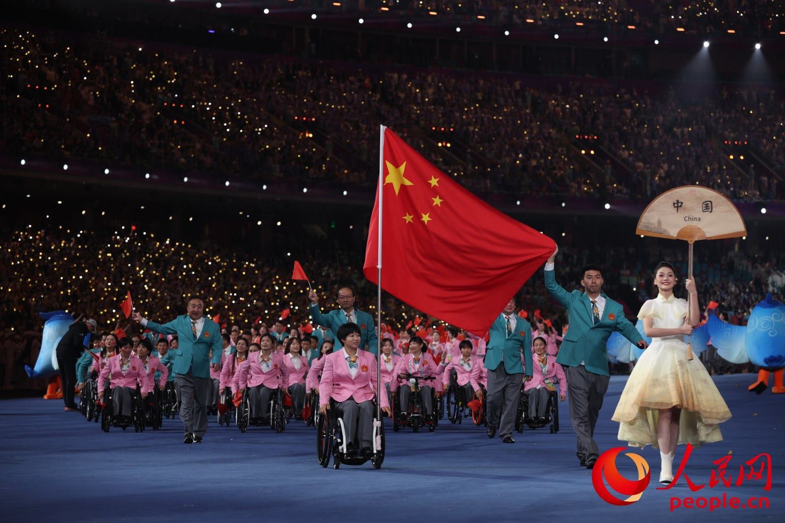 開幕式上，中國體育代表團入場。人民網(wǎng) 周靜圓攝