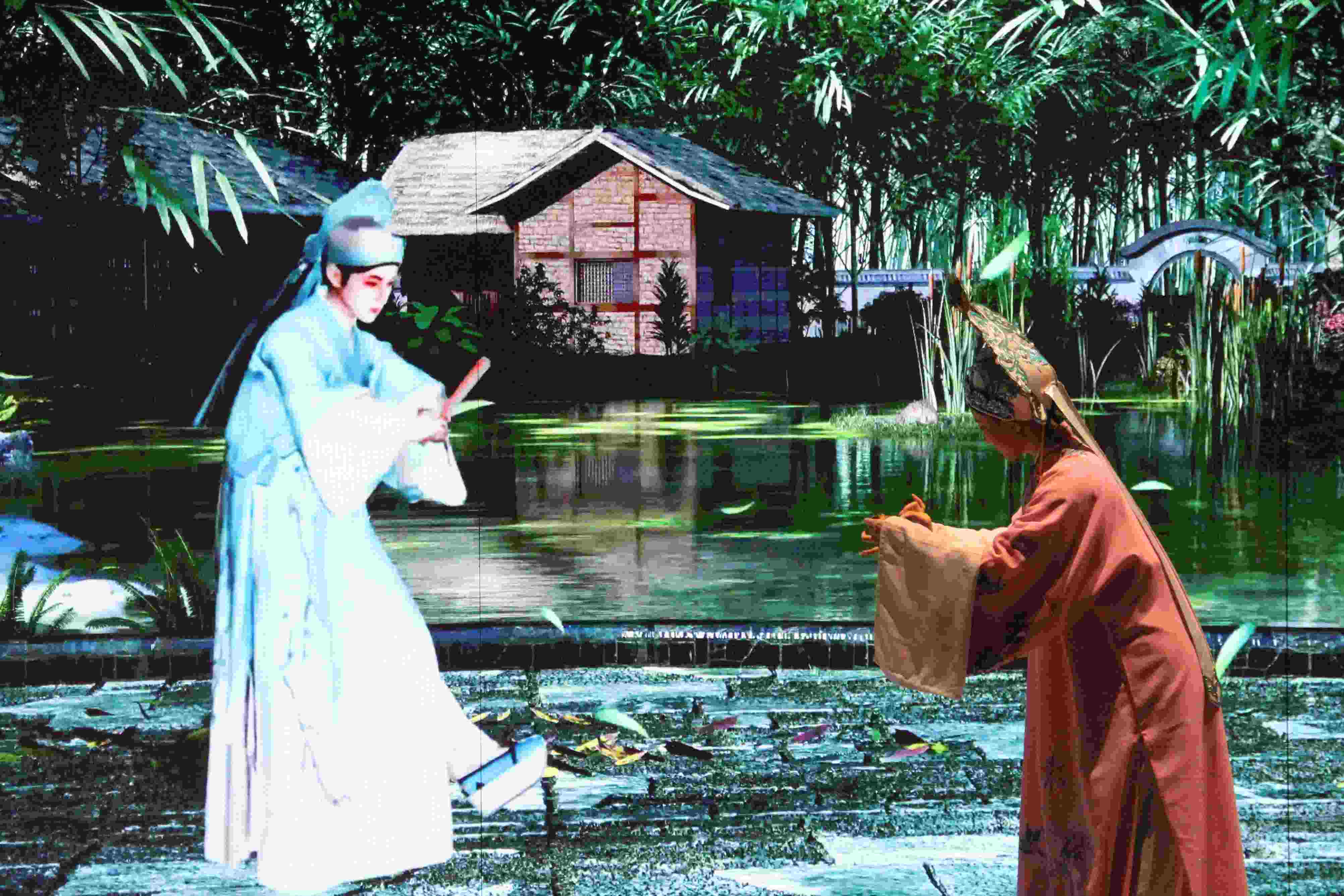 真人演員與虛擬人演員在“元啟金陵”南京數(shù)字文化客廳出演《梁山伯與祝英臺(tái)》經(jīng)典選段。受訪者供圖